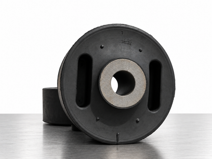 Tri-functional suspension bushing, front view of the metal sleeve and rubber cavities
